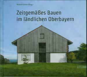 Titelseite des Buchs mit Titel und Foto von einem modernen Haus in Bayern